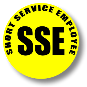 Reflective Short Service Employee (SSE) Hard Hat Sticker - Black Text on Yellow Background - 1.5 inch diameter